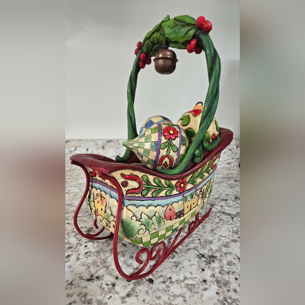 Hand-Painted Decorative Sleigh Bag with Green and Red Accents